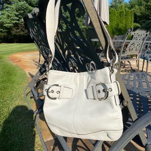 Coach purse.  Used. Slvr buckles. Adjustable strap.  See pics for imperfections